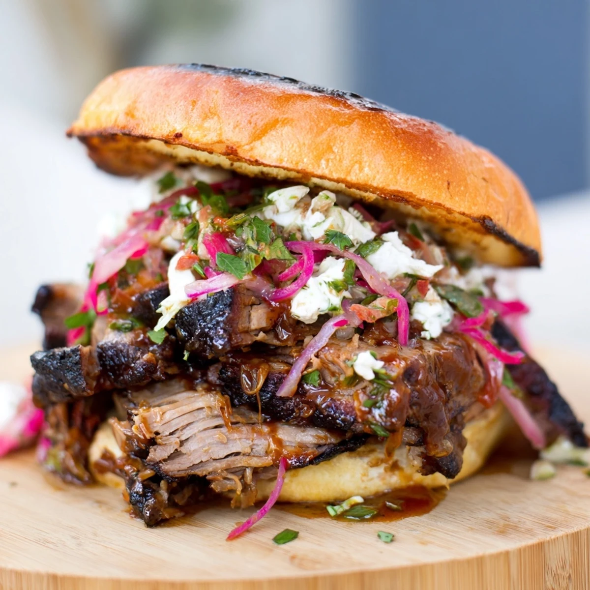 Fire-Kissed BBQ Pulled Pork Sandwiches, piled high on toasted buns, boasting smoky BBQ flavors.