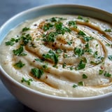 White Bean and Parmesan Soup served hot in a rustic ceramic bowl, perfect for cozy autumn dinners.  
