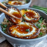 Soft-boiled eggs soaked in a spicy miso marinade, infused with ginger and garlic for bold flavor.  