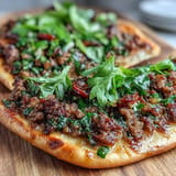 Mouthwatering Turkish Lahmacun Pizza, hot from the oven with fresh toppings.