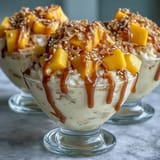 Thai dessert perfection: vibrant mango atop creamy coconut sticky rice.