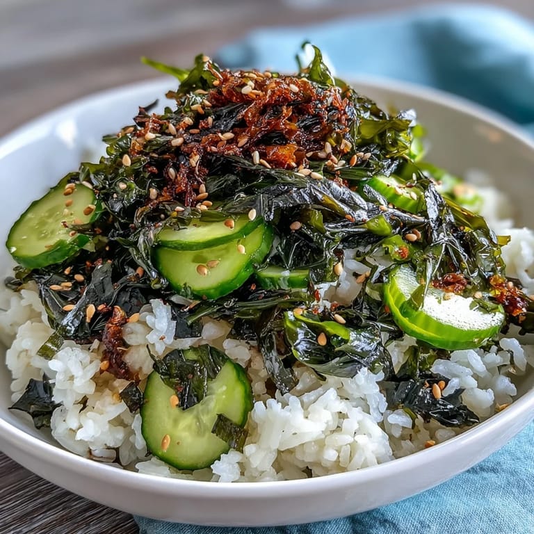 Easy Seaweed & Nori Rice Bowl with tender sushi rice, assorted seaweed, crunchy cucumber, and optional furikake for a refreshing vegan dish.